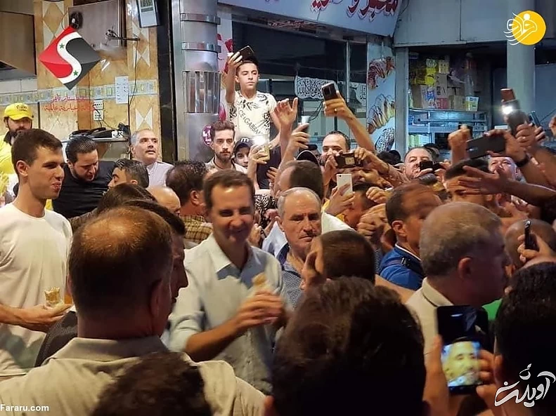 ساندویچ خوری بشار اسد و خانواده اش در خیابان‌ های دمشق/ عکس